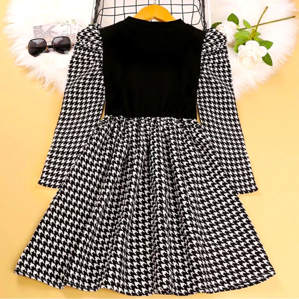 Fashionable girls fall/winter dress.